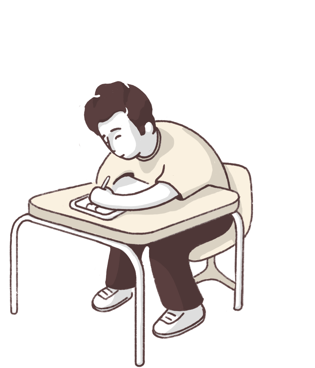 Guy drawing at desk